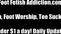 The femdom mistress commands foot worship in bdsm ritual. Submissive indulges in fetish pleasures with her feet.