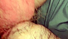 Gay guy receives deepthroat blowjob in his mouth.