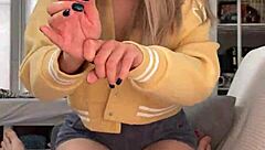 Amelie Dubon gives a pretty woman a handjob as friends