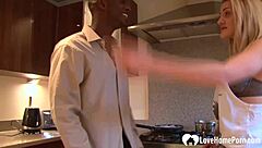 A beautiful blonde gives a blowjob to a big black cock