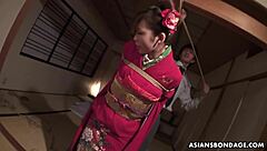 Tied Up Asian Bimbo Sucks Two Cocks And Gets Toyed