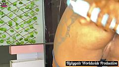 A lady dressed in red poses elegantly.