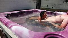 Skinny beauty enjoys hot tub time