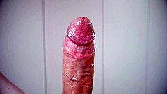 i demonstrate how to slowly handjob a big lubed cock until cumshot
