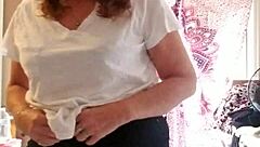 She Applies Lotion to Her Sexy Skin