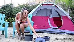 Natural busty brunette enjoys beach day