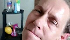 Dirty milf slut spits cum on her big tits in cuckold scene