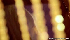 An Indian film actress strips and gets intimate alone