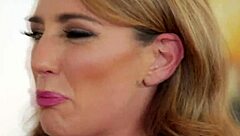 This brunette pornstar takes a cumshot from monster cock.