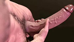 carlos suggestively strokes big white cock