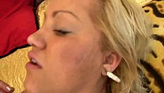 busty blonde slut in fishnet stockings and big tits enjoys and moans as hot cum splashes on her