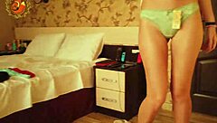 Redhead Foxy Tries On Panties For Holiday Romance