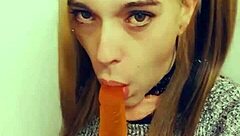 Pretty Shemale On Knees Sucks Cock