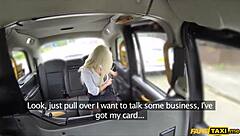 Spycam captures big-boobed blonde real estate agent in action in a taxi