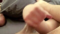 A man with a small penis giving a handjob