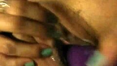 Hey, check out this latina's squirting with dildo