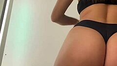 Wife Changing Clothes In Store Fitting Room.