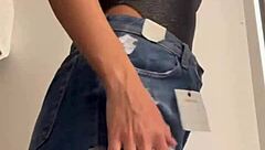 Wife Changing Clothes In Store Fitting Room.