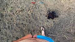 Solo girl masturbates under a bridge in this homemade video