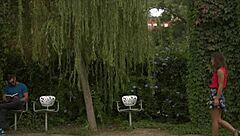 Public upskirt shows bush while sucking monster cock outdoors