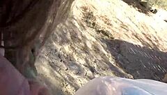 Blonde teen with tattoos performs webcam striptease outdoors