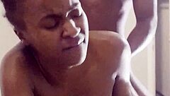 Petite ebony gets banged in doggy style by a big black cock