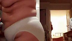 my wife lounges in big panties in the kitchen, teasing me softly