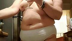 my wife lounges in big panties in the kitchen, teasing me softly