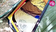 Detailed scene of girl masturbating solo during camping trip in hentai style