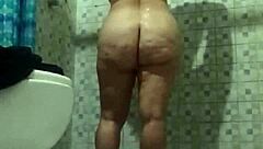 Hidden camera in shower. Spying on mature stepmother.