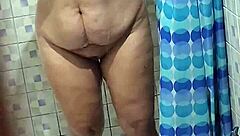 A mature Venezuelan woman next door takes a shower and is secretly videotaped