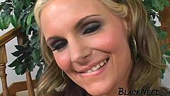 A blonde with big natural tits gets her first taste of a black cock