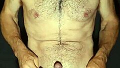 Gay man exhibits big cock and masturbates