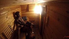 A black guy gets a blowjob and cum inside a sauna in a hidden camera video