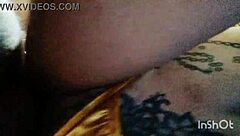 Beautiful women with tattoos enjoy a sensual experience
