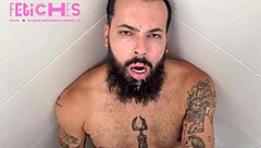 Gay fetish video: bearded man spits during hot gay sex scene