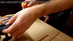 Naked gay chef cooks rice noodle with chicken and vegetables