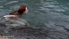 Misha Lowe flaunts massive tits by the pool