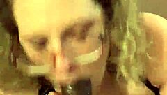 Close up of an amateur giving a black cock sucking blowjob