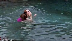 Misha Lowe flaunts massive tits by the pool