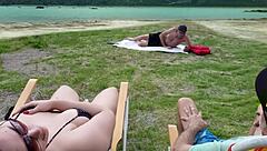 A beautiful man enjoys himself while pleasuring himself outdoors