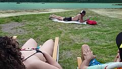 A beautiful man enjoys himself while pleasuring himself outdoors