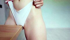 Skinny blonde gets naked and masturbates with a bald vibrator