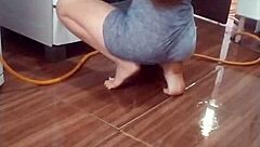 Detailed Footage Of My Naked Employee Washing The Stove, Revealing Her Amateur Fetish Side.
