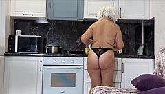 Stepmom in thong gets fucked in the kitchen