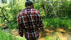 pawg lumberjack strips naked in the forest