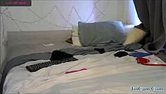 I watch my tattooed partner fuck me live on webcam.