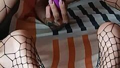 Foot fetish guy fucks her deliciously, cumming on her fishnet feet.