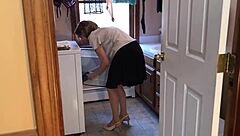 A sexy milf gives in to a neighbor boy in the laundry room
