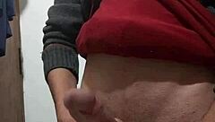 i'm jerking off with my clothes on, feeling the skinny cock in my hand as i masturbate alone.